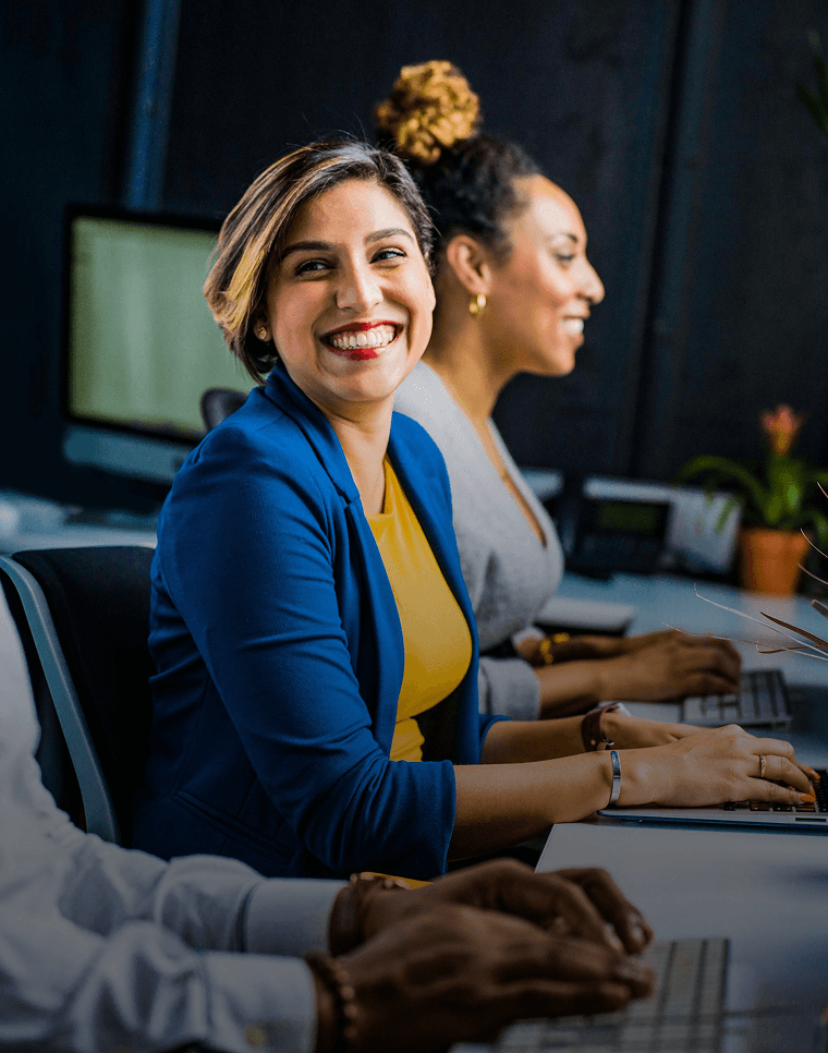 Happy employees use language learning platform in their workplace.